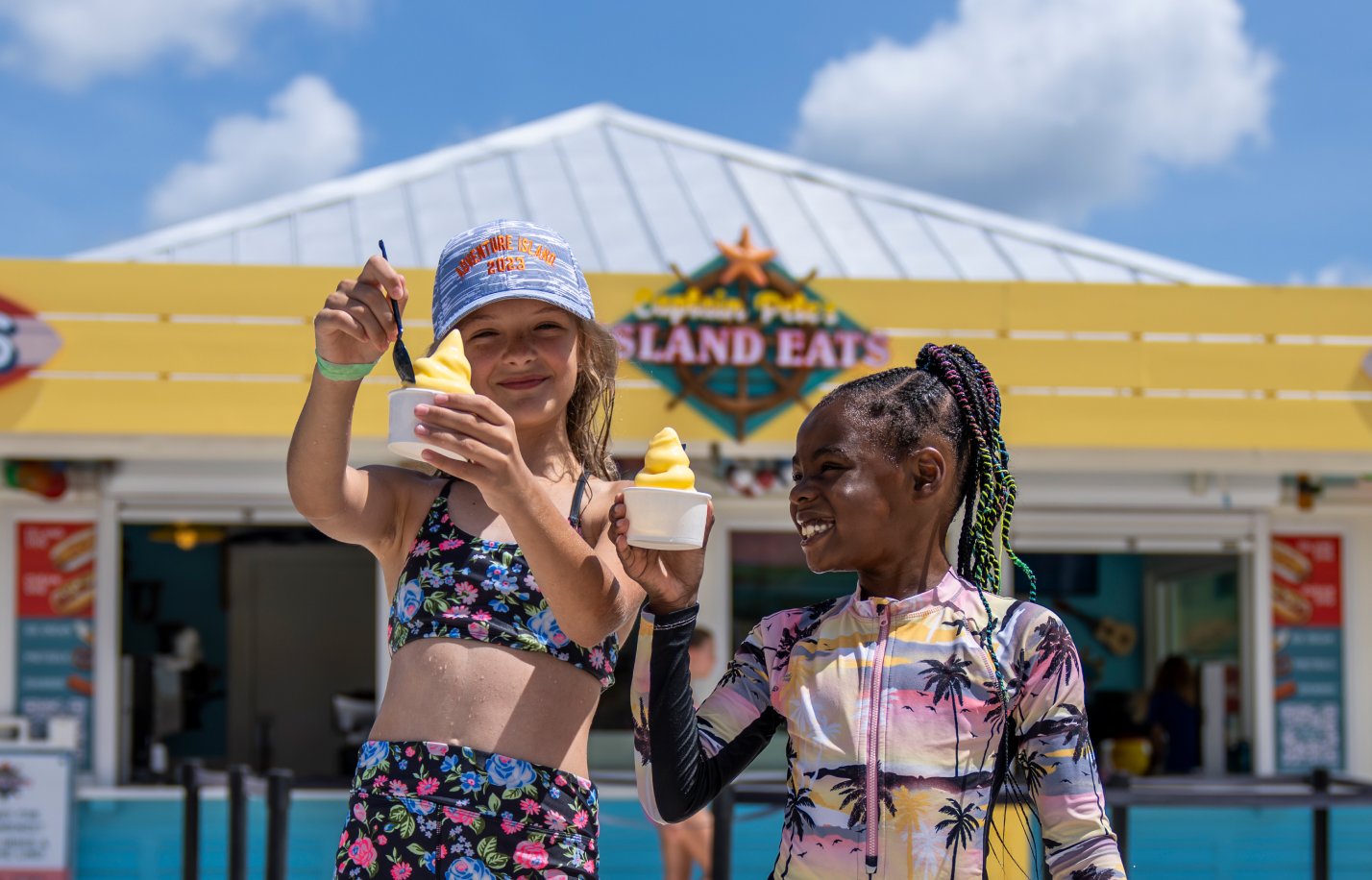 Two  girls in front of captain petes.